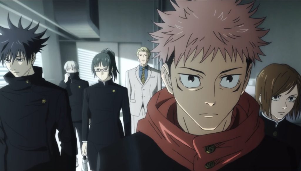 Yuuji staring at the camera as his friends follow behind him from Jujutsu Kaisen